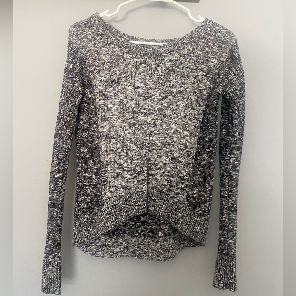 Knit sweater.